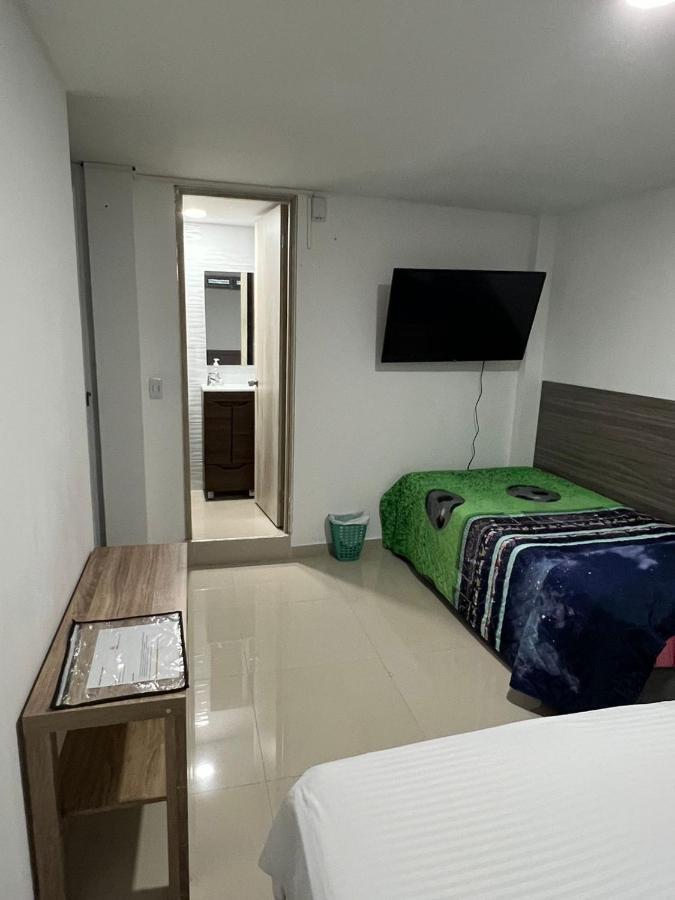 ホテル Edificio Niza80 Ibague, Acceso Digital Cerca Parque Deportivo エクステリア 写真