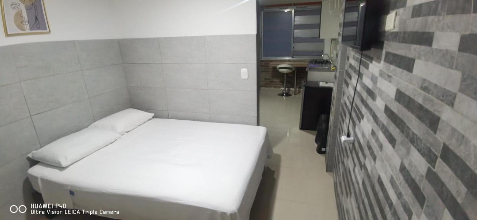 ホテル Edificio Niza80 Ibague, Acceso Digital Cerca Parque Deportivo エクステリア 写真